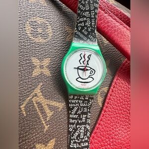 Swatch Green Case Black Text Strap Coffee Cup Dial Watch